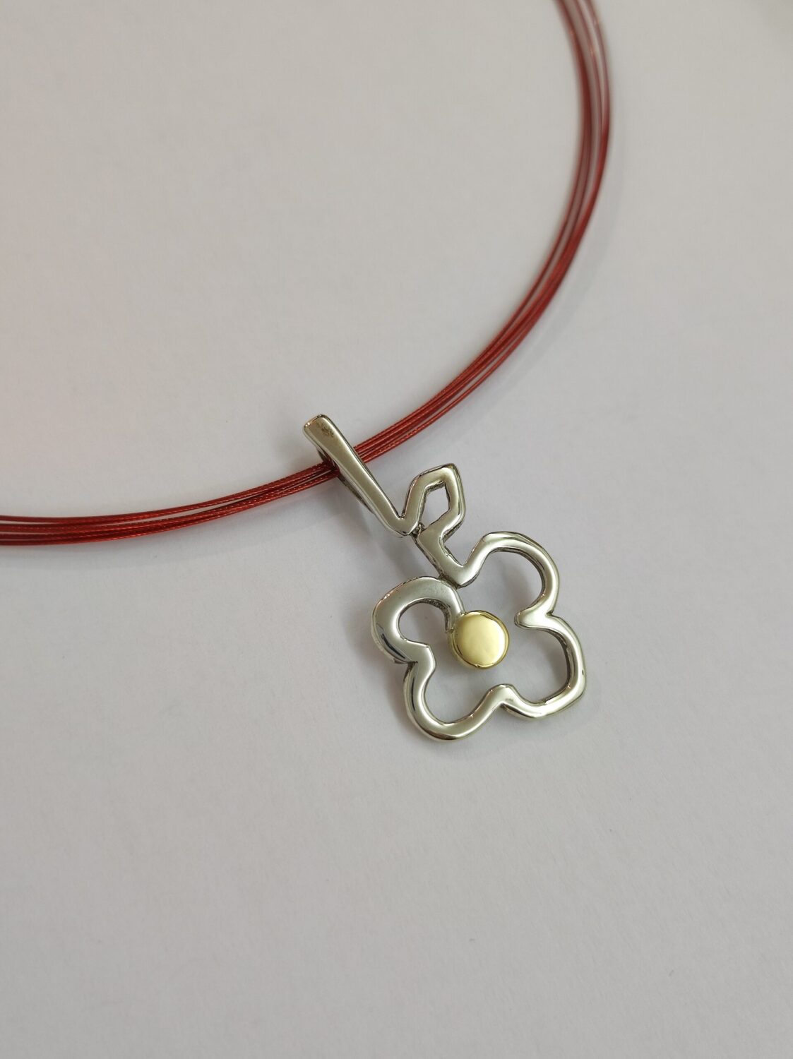 Colgante plata y oro