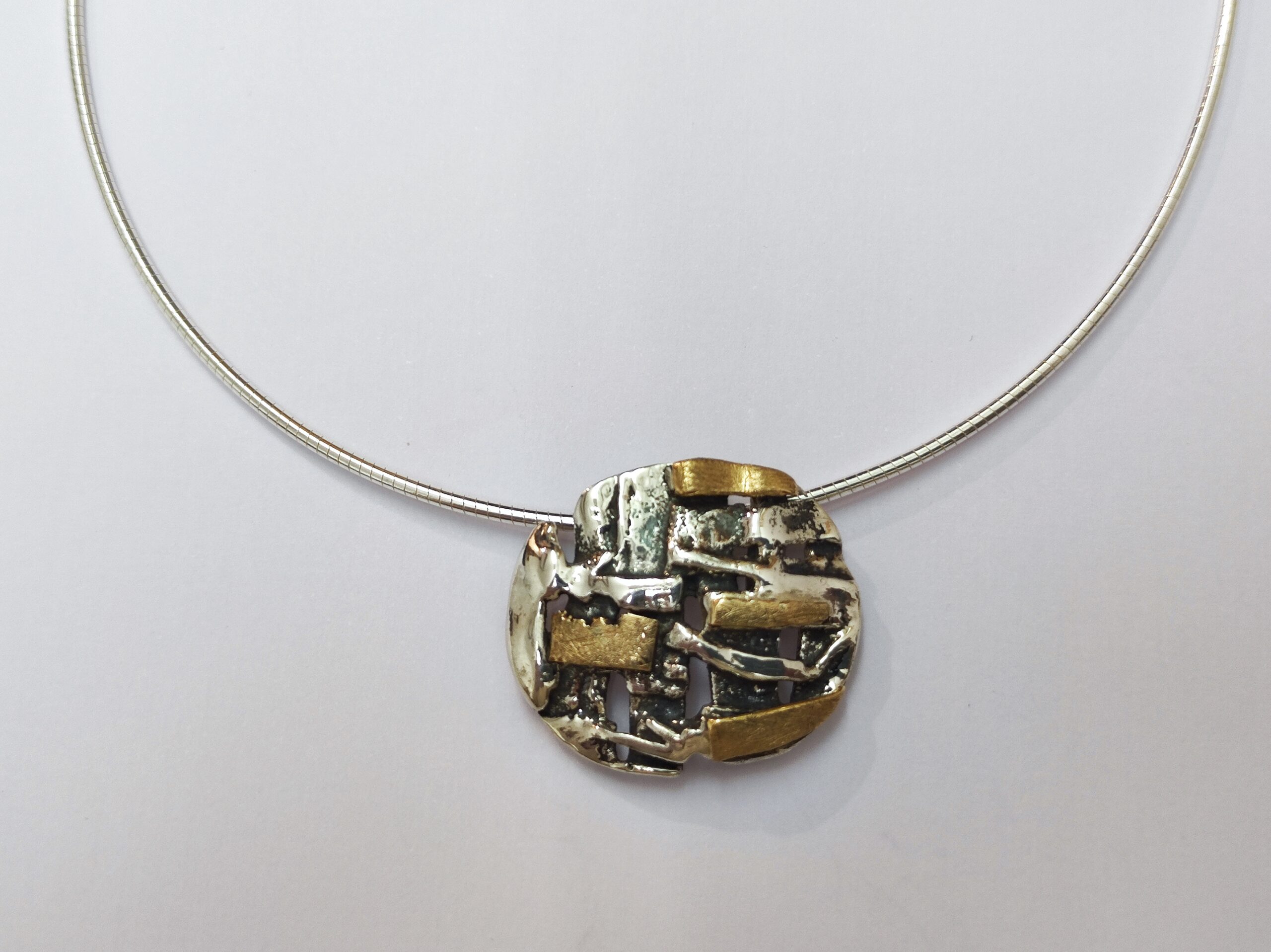 Colgante plata y oro